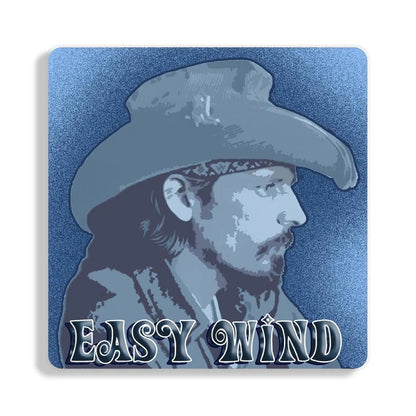 A square metal sign with rounded corners featuring Pigpen wearing his classic cowboy hat, with the text 'EASY WIND' at the bottom, shown against a plain white background.