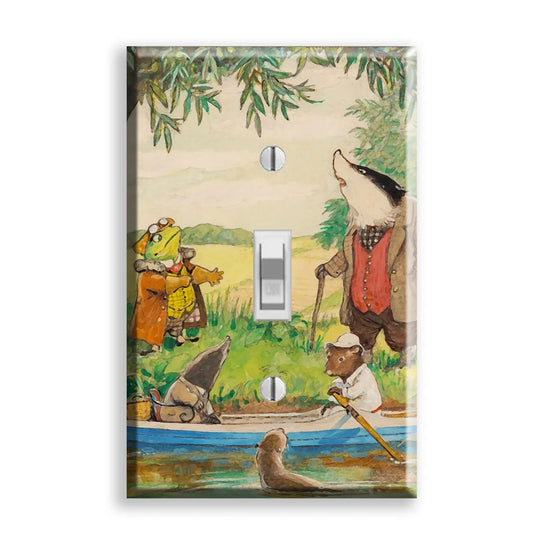 A rectangular light switch plate cover featuring a whimsical illustration of animals by a river. The design shows a badger in a brown coat and vest, a frog in an orange outfit, a bear in a canoe, and a small dog in the water, under green leaves.